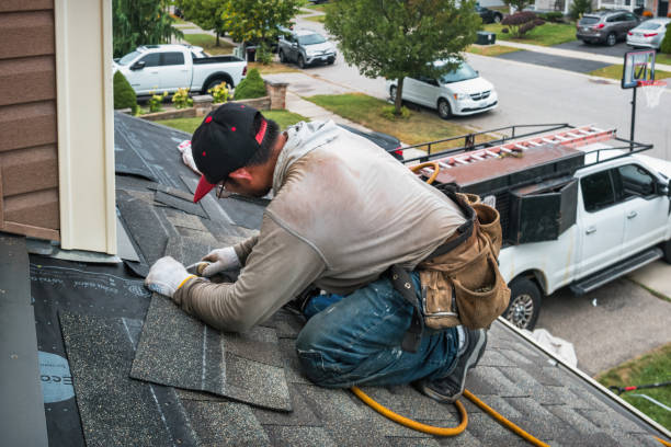 Professional Storm Damage Roof Repair technician working in Hillsboro, KS